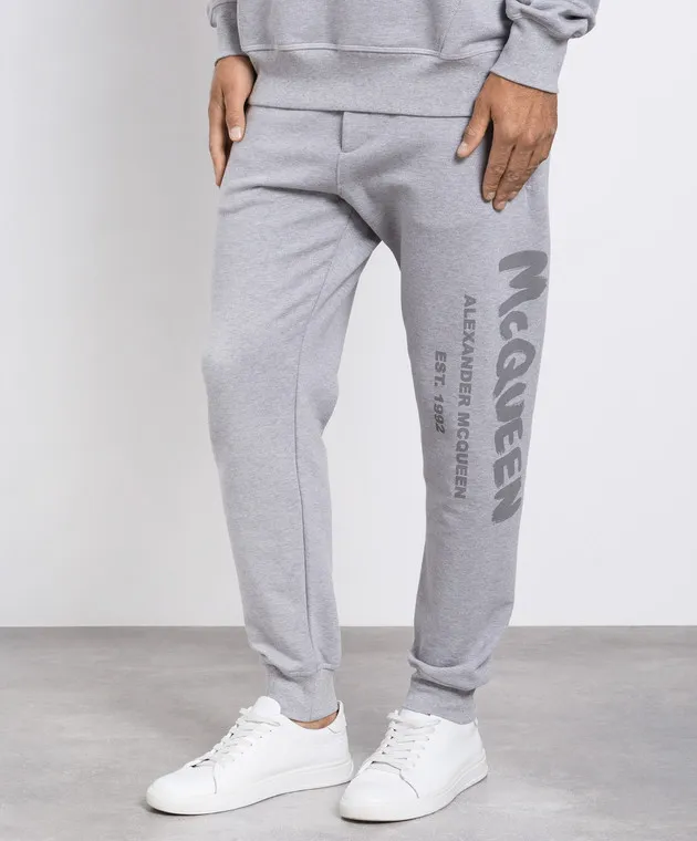 Alexander McQueen Gray joggers with graffiti logo print