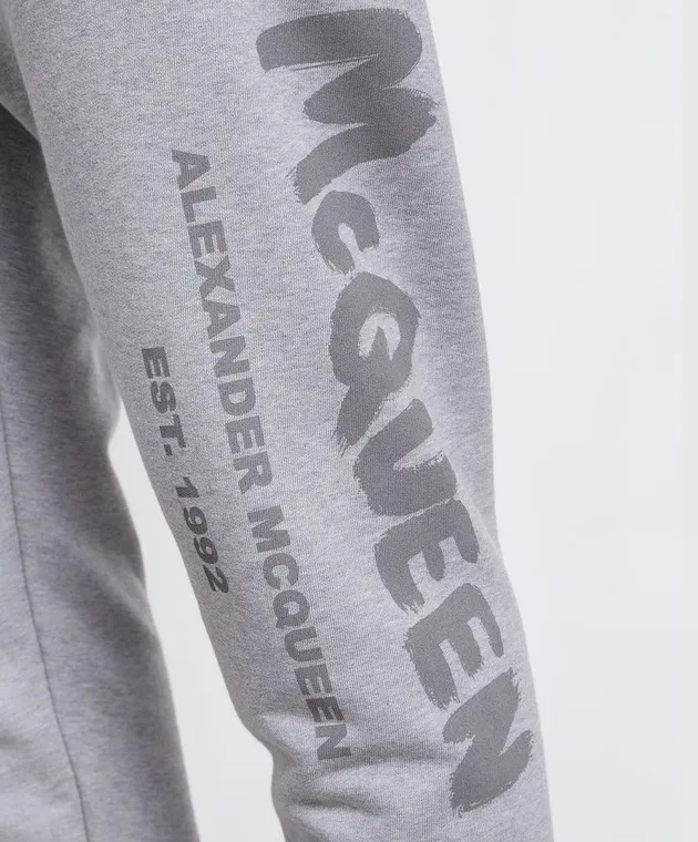 Alexander McQueen Gray joggers with graffiti logo print