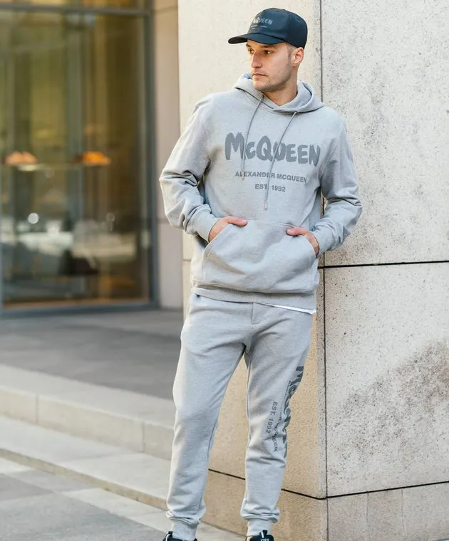 Alexander McQueen Gray joggers with graffiti logo print