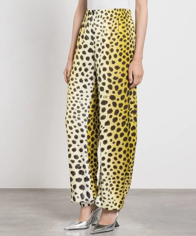 The Attico Yellow joggers in a leopard pattern