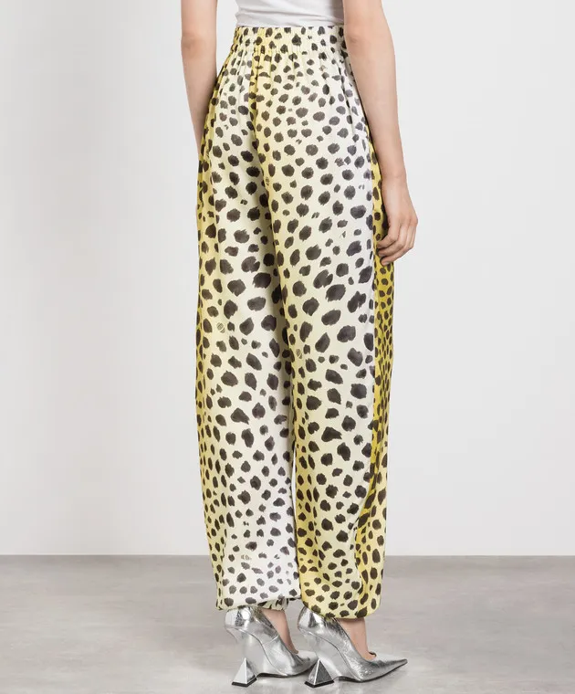 The Attico Yellow joggers in a leopard pattern