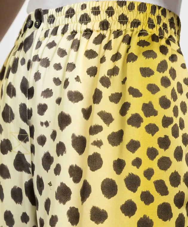 The Attico Yellow joggers in a leopard pattern